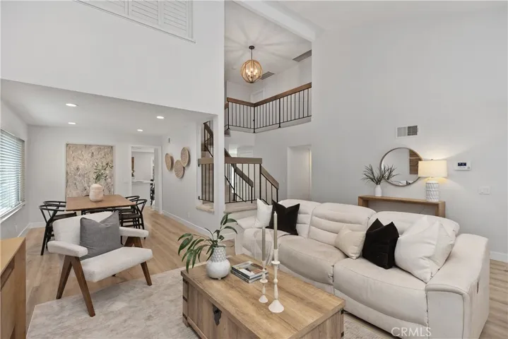 Wood-like flooring throughout main living area.