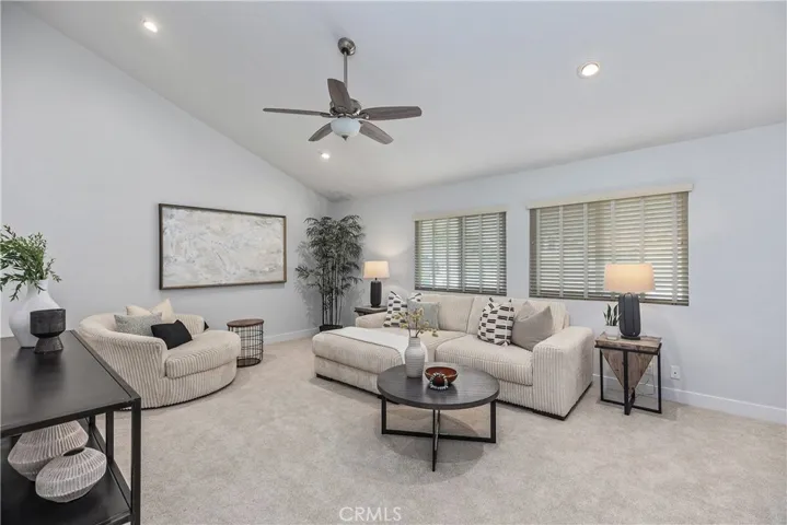Bonus room features ceiling fan and recessed lighting.