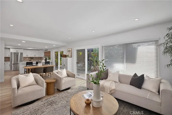 Another sliding door that opens to the backyard.