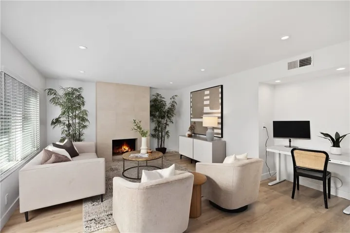 Family room has fireplace for those cold winter nights.