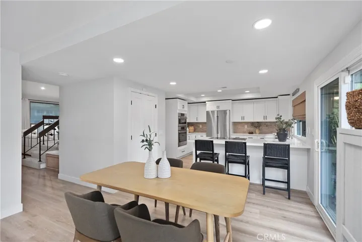 Recessed lighting throughout kitchen and casual dining area.
