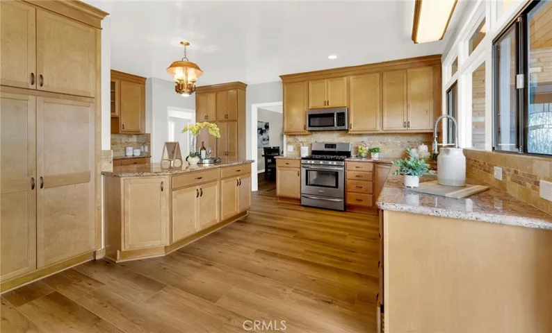 Huge open kitchen with island and breakfast bar