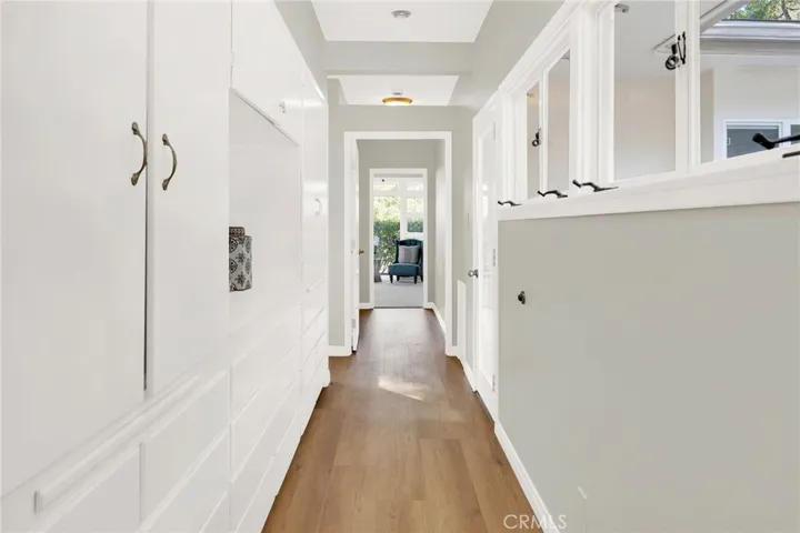 Hallway connecting bedrooms to kitchen