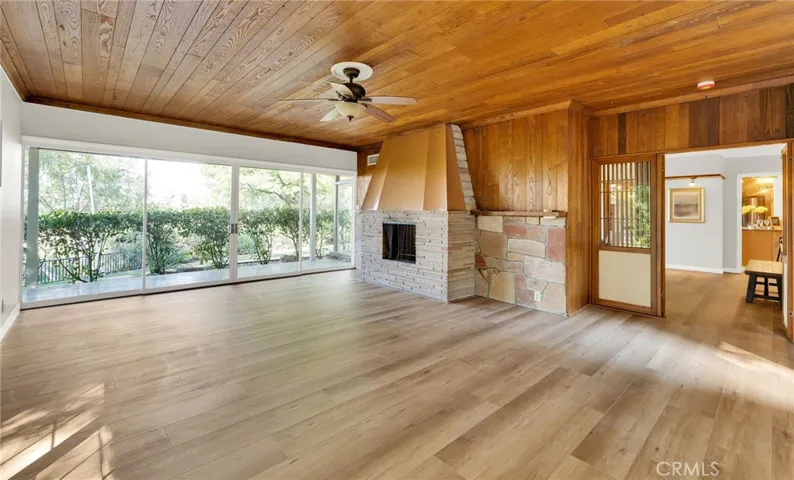 Family room is spacious enough for a pool table, foosball, children's play room, or anything else you can think of
