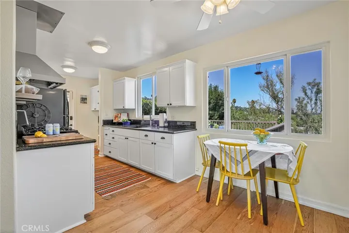 Galley kitchen opens to expansive view deck
