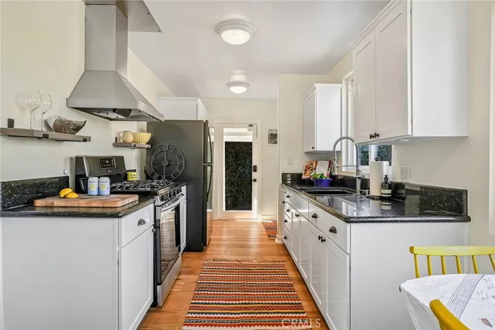Galley kitchen opens to oversized (approx. 450 sf) view deck