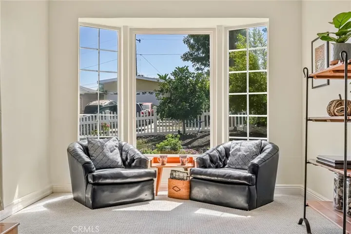 Drink your morning coffee and enjoy view of the Port and the front garden from the picture window. A perfect place to display the holiday tree.