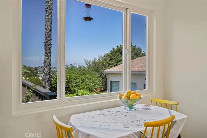 In-kitchen seating area embraces sweeping views of South Bay