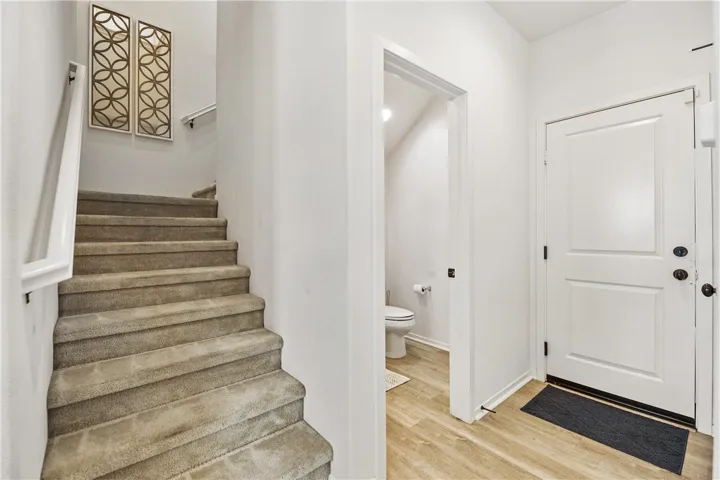 Direct garage access. Garage has plenty of storage with over head storage bins & shelving.