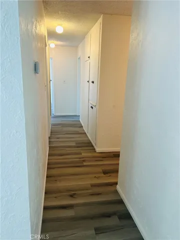 Hallway w/plenty of storage, linen closet & more