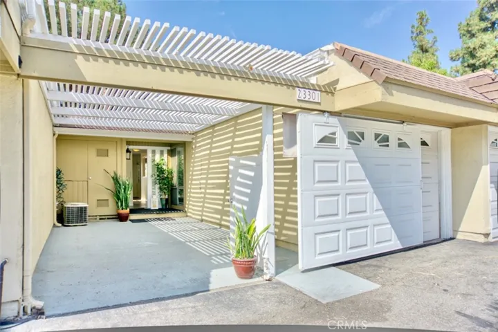 1 car garage with sliding carport in open position