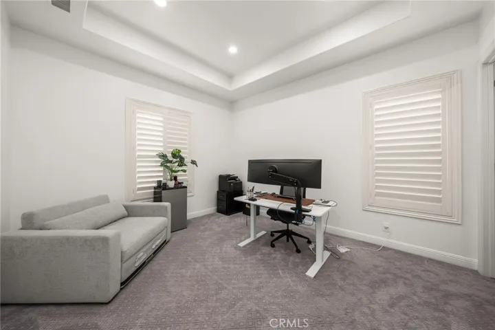 downstairs bedroom with private full bathroom