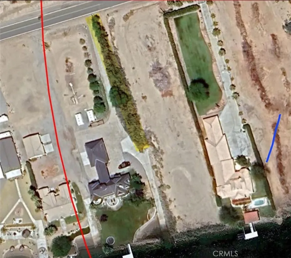 Tree section on left side of property is the County easement.