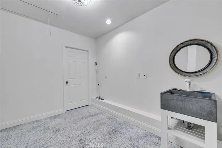 MUDD ROOM CONVERTED ONE CAR GARAGE SPACE