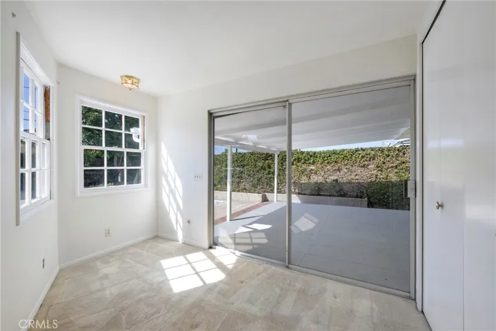 Bedroom 3 opens to covered patio