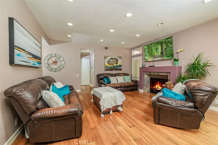Another view of the family room. The hall at the far end leads to the laundry room, downstairs bathroom, and 3-car attached garage