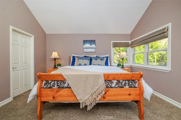 Large walk-in closet is behind the door on the left