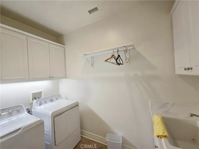 Laundry room with sink