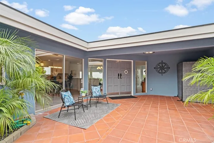 Beautiful lanai patio at front door.