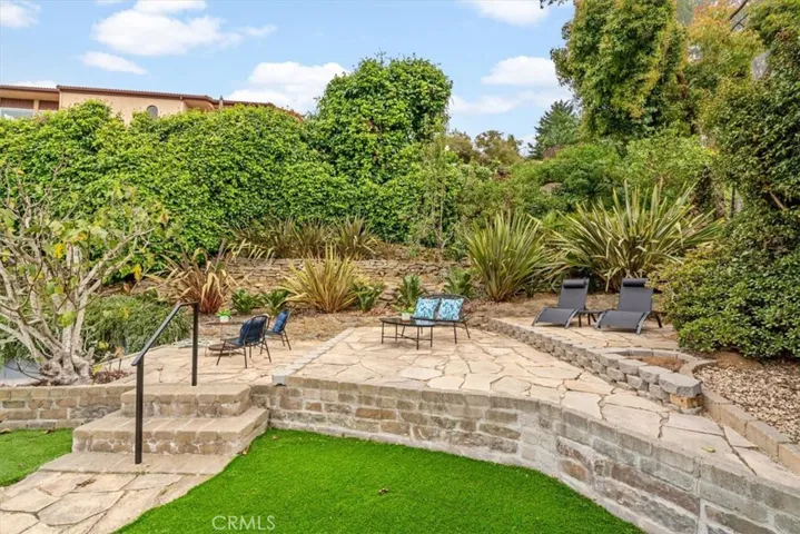 Tiered stone patios for more views and lounging.