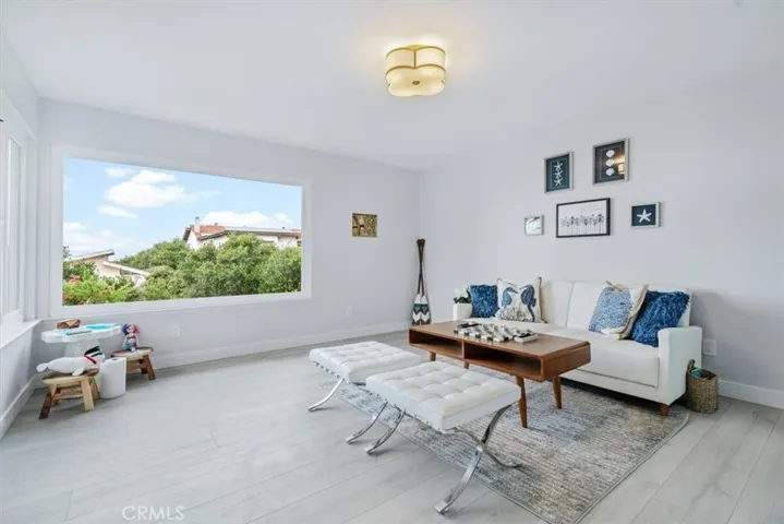 Bedroom One is staged as a Den.  Huge multipurpose room with panoramic ocean views.