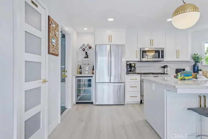 Comes with new wine fridge and a new french door Bosh refrigerator.