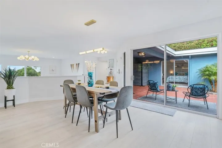 Dining area has view of  front lanai patio.