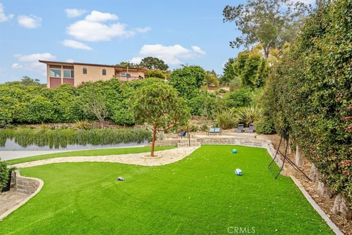 New synthetic grass play and lounging area.