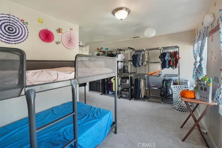 The unique shape of Bedroom 3 makes it very spacious.