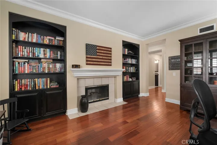 Stunning office with built-ins and fireplace