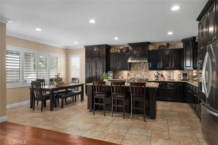 Expansive eat-in kitchen area open to the family room