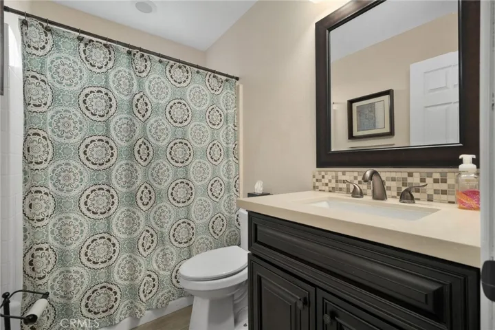 Full downstairs bathroom with tub/shower combo