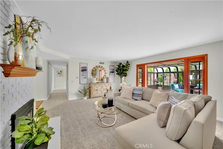 Step inside to fresh interior paint and scraped ceilings throughout, complemented by dual pane windows, air conditioning, and brand-new carpeting for ultimate comfort.