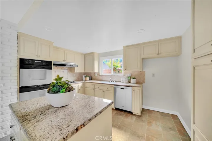 The spacious center island provides additional storage
