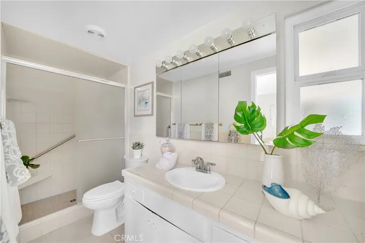 Walk in shower with glass doors