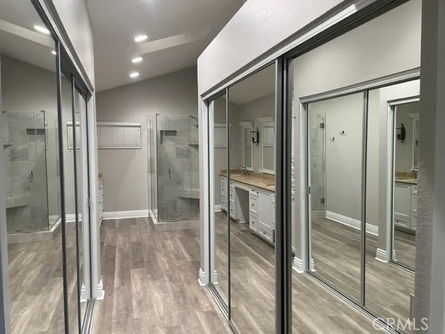 Mirrored Dual Wardrobes
in Primary Suite