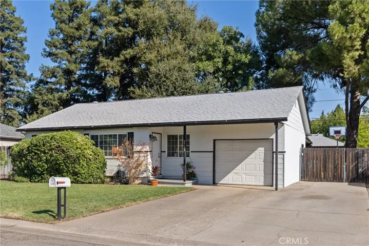 Front of house with RV parking