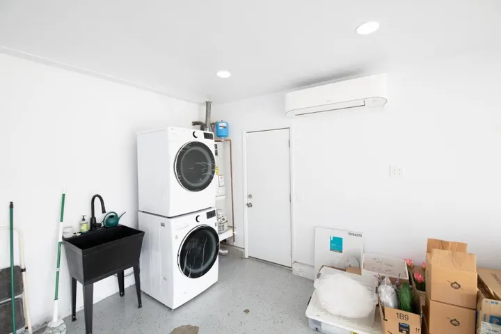 "Heat Pump/Mini-split" heats and cools garage separately from house.