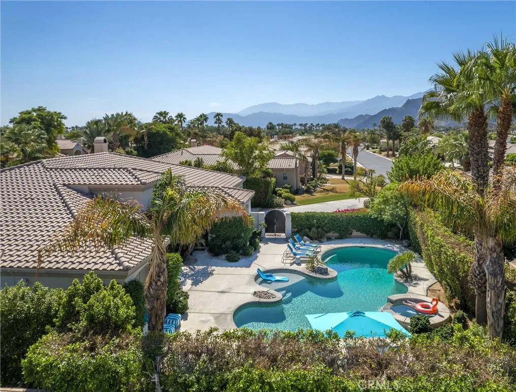 Views of the mountains and palm trees, with mature landscaping for privacy Views of the mountains and palm trees, with mature landscaping for privacy