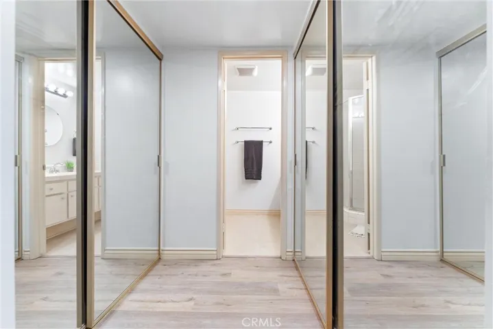 You have two closets on both sides of the hallway the leads to your private bathroom
