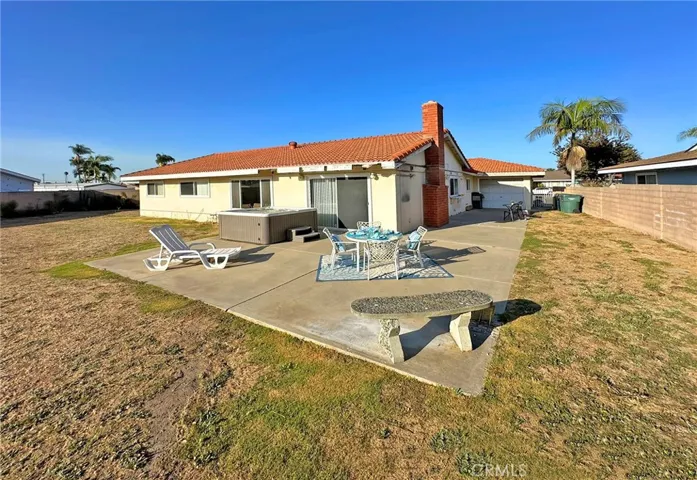 Wrap-Around Patio, Fiberglass Hot Tub, Shed on Side Yard, Plus Pass-Through Garage Door to Backyard from the 3rd Car Garage
