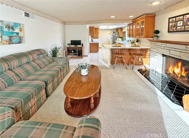 Family Room has Fireplace with Mantel