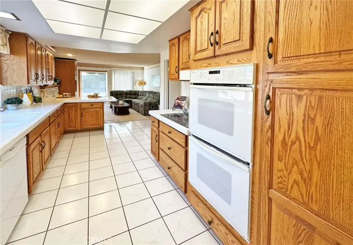 Kitchen has Double Ovens, Pantry with Pull-Outs, Dishwasher, Electric Cooktop