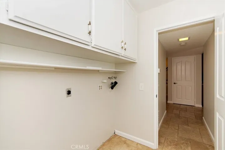Convenient inside laundry room direct access to the garage