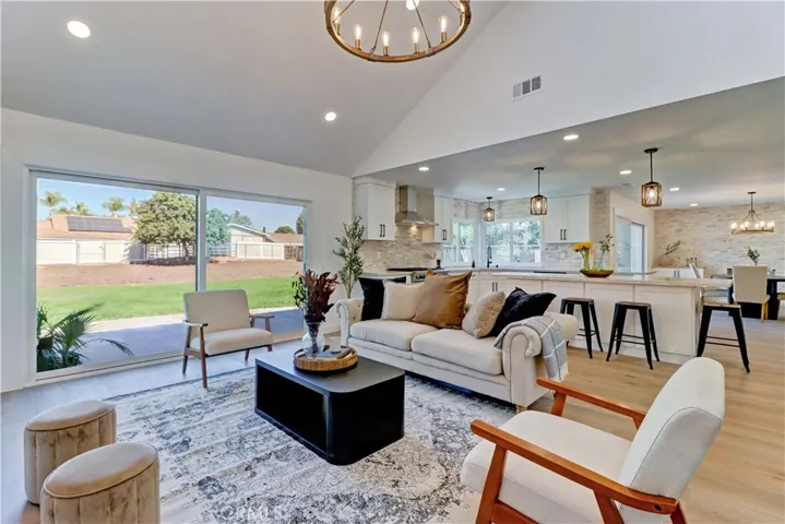 Living room opens to kitchen and dining room