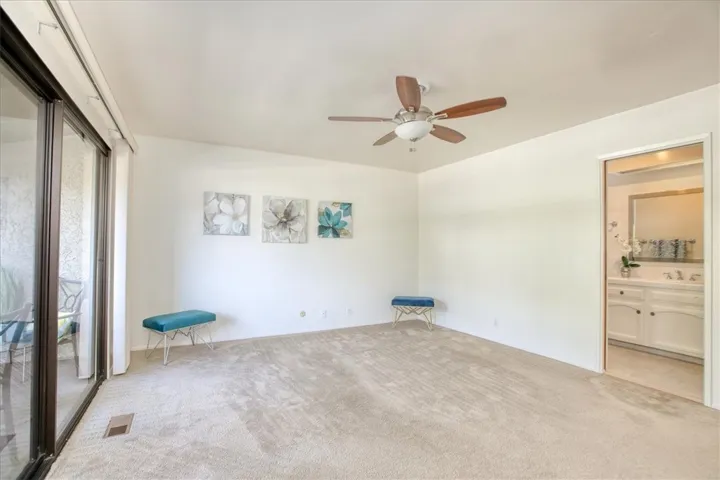 Primary Bedroom with Silder Door to Balcony