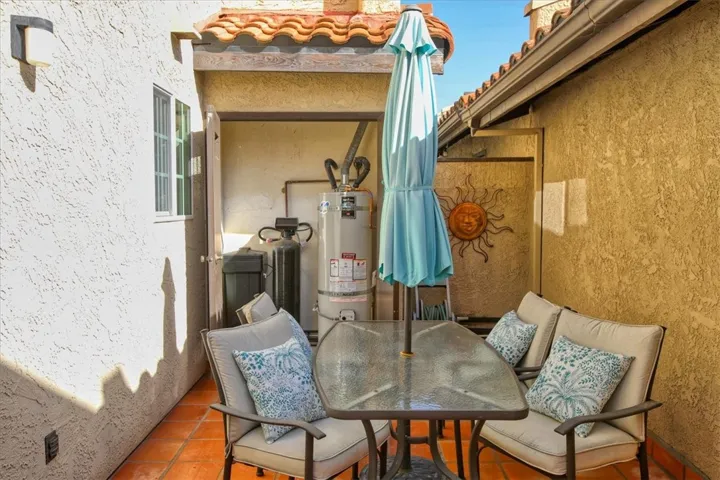 Water heater and Water Softener in closet off of patio
