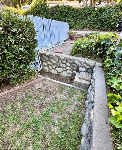 Front yard west view to upper terrace