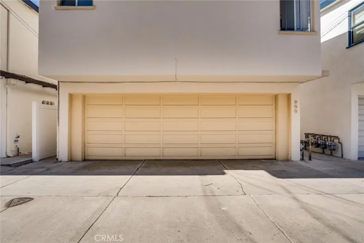 Oversized 2 car + garage facing alley at the back of the home