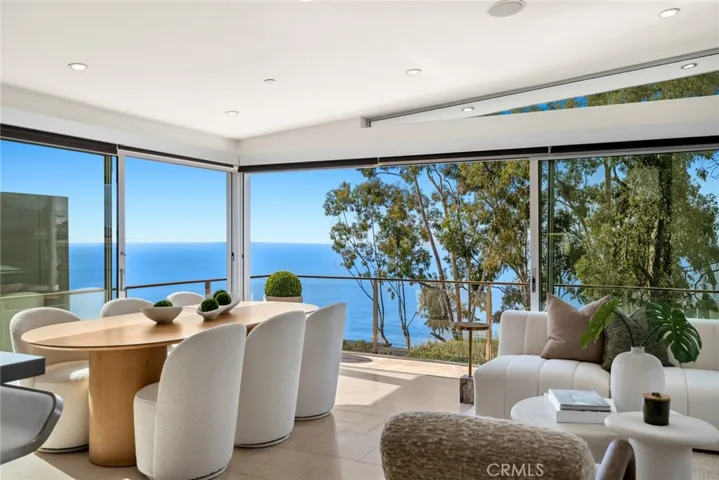 Magnificent views of the Pacific Ocean, Catalina Island, shimmering white water, colorful sunsets and sparkling evening lights lend enchantment to every occasion at this upgraded architectural showplace in Laguna Beach.